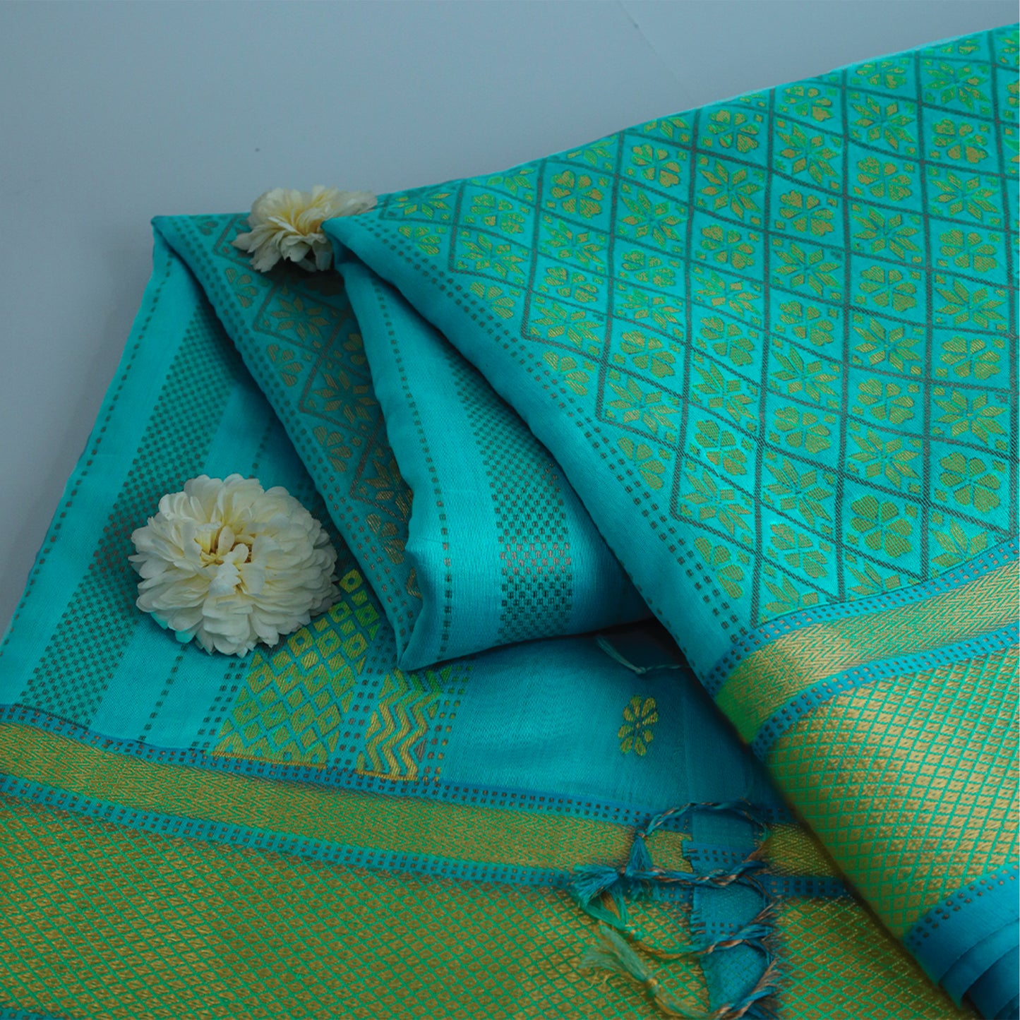 Turquoise Cotton Maheshwari Saree with Floral Buttas