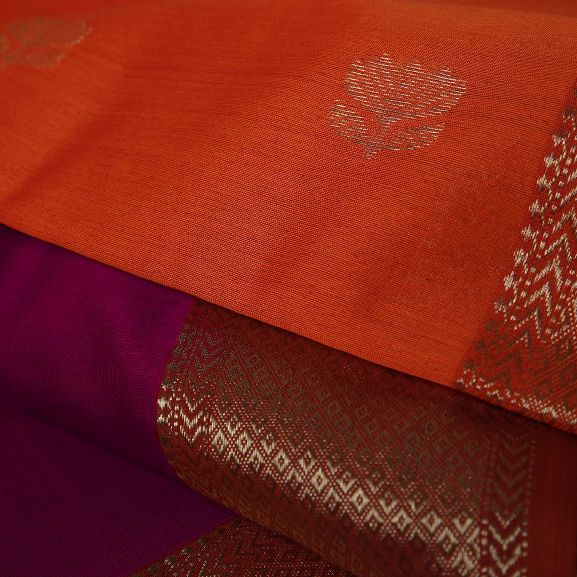 Magenta Silk Maheshwari Saree with Orange Pallu